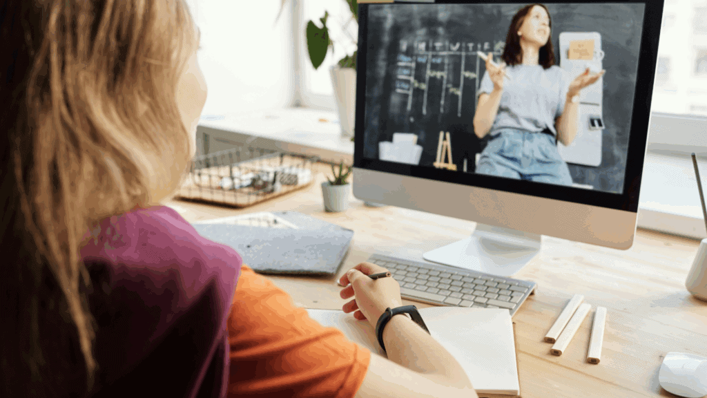 4 Traditional Schooling Alternatives: Homeschooling, Unschooling, Online Schooling, or something better? A Parent’s Guide. 3 Online Schooling: A child looking at a screen.